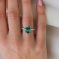 Classic Oval Cut Solitaire Emerald Green Engagement Ring In Sterling Silver
