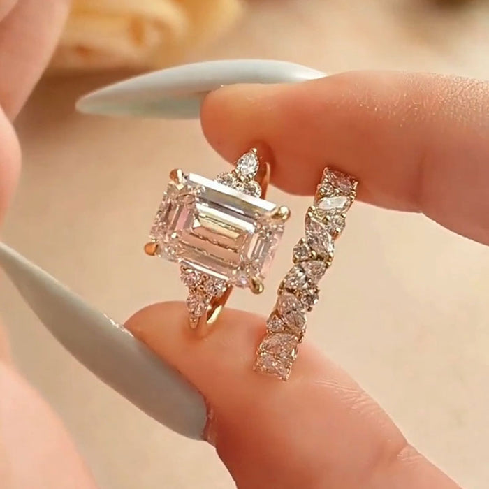 Daity Emerald Cut Three Stone Sterling Silver Bridal Set