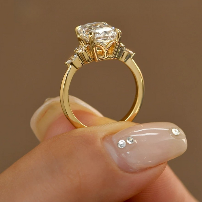 Daity Emerald Cut Three Stone Sterling Silver Bridal Set