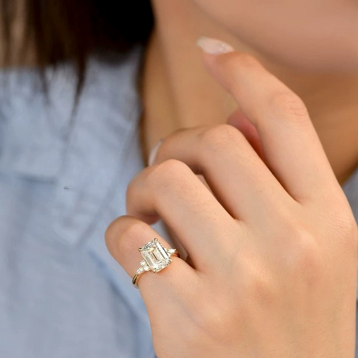 Daity Emerald Cut Three Stone Sterling Silver Bridal Set