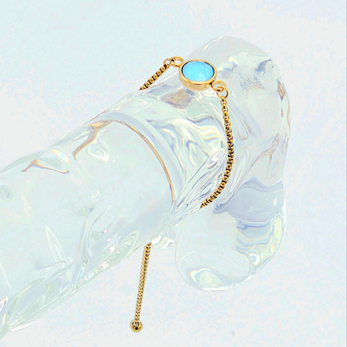 Gold Penis Noose Bracelet with Blue Gemstone