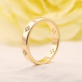 Golden Tone Art Carved Wedding Band