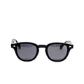 Black sunglasses with dark lenses on a white background