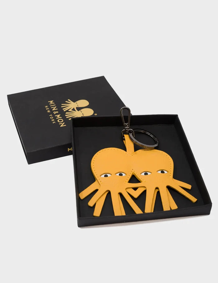 Octotwins Charm - Golden Glow Leather Keychain - Box View