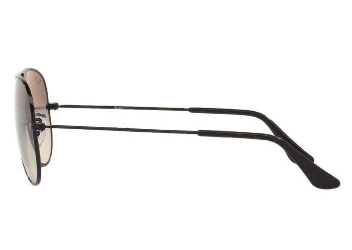 Sunglasses with black frame and reflective lenses on a white background