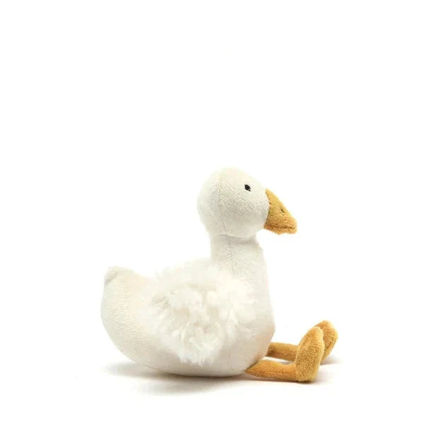 Plush toy goose on a white background
