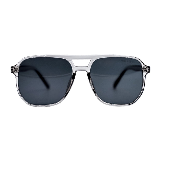 Sunglasses with dark lenses and silver frame on a light gray background